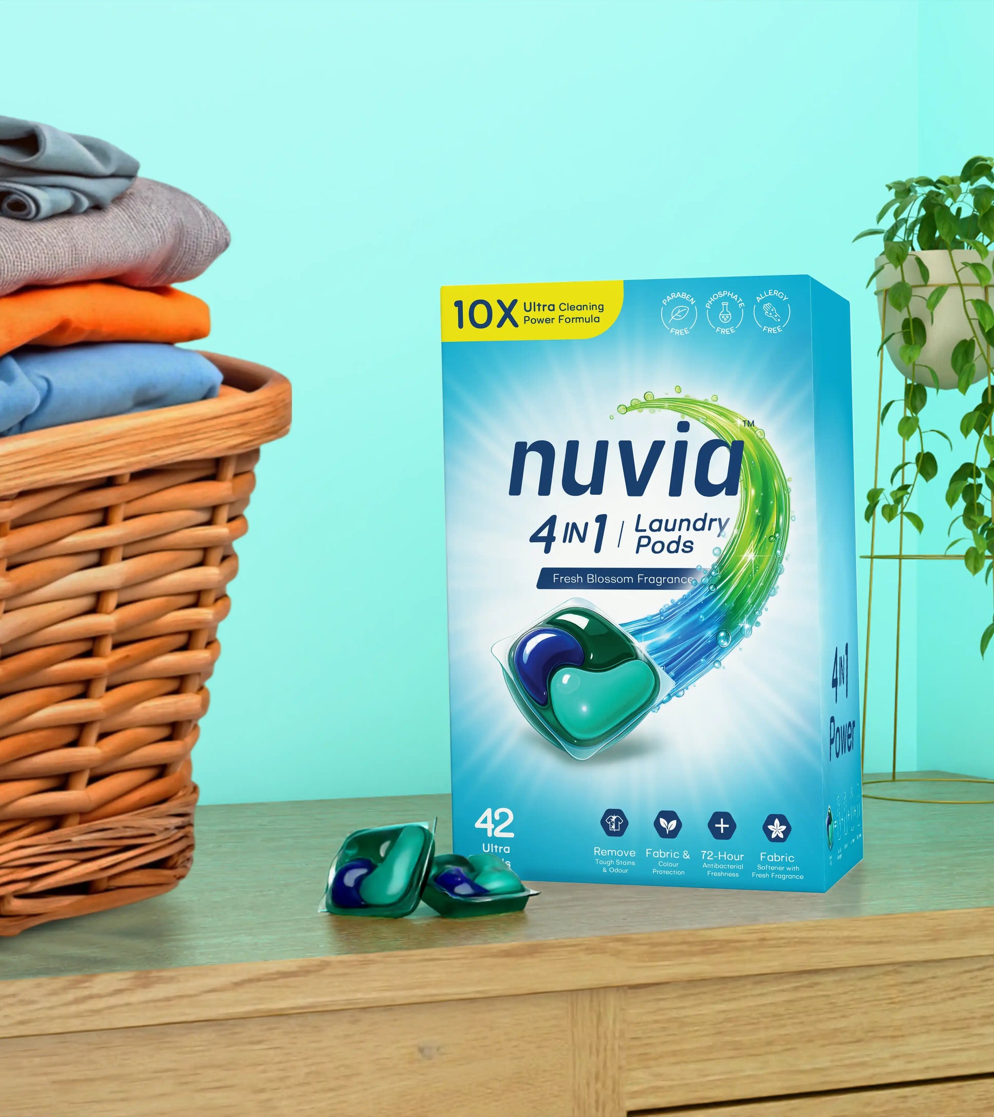 Nuvia 4in1 laundry pods packaging with laundry basket and clothes on a light blue background